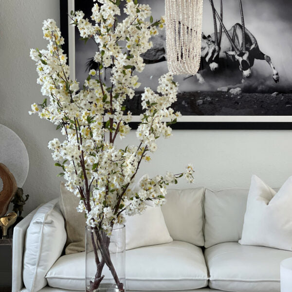 Cherry blossoms in a 16-inch glass cylinder