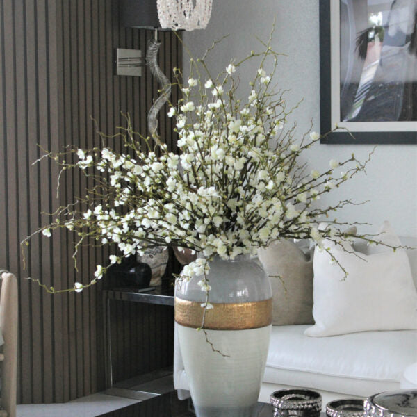 Goddess vase with cherry blossom branches
